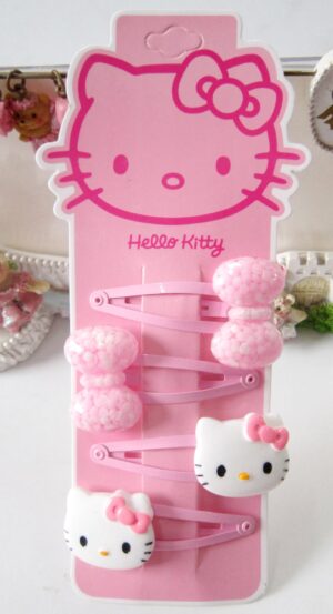 Barrette nœud Hello Kitty rose clair